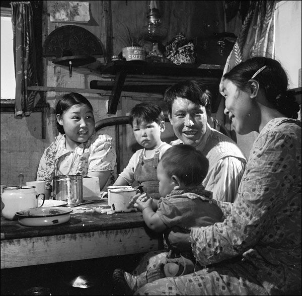 Inuit family in their house