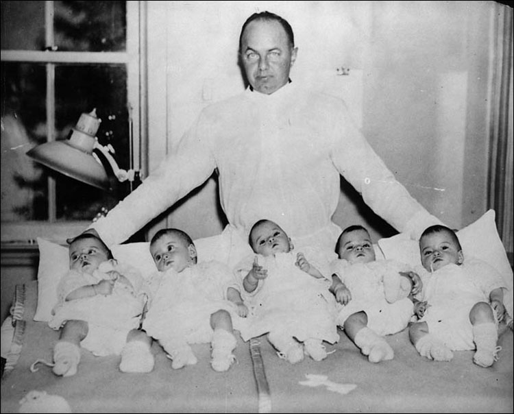 Mitchell Hepburn with the Dionne quintuplets, 1930