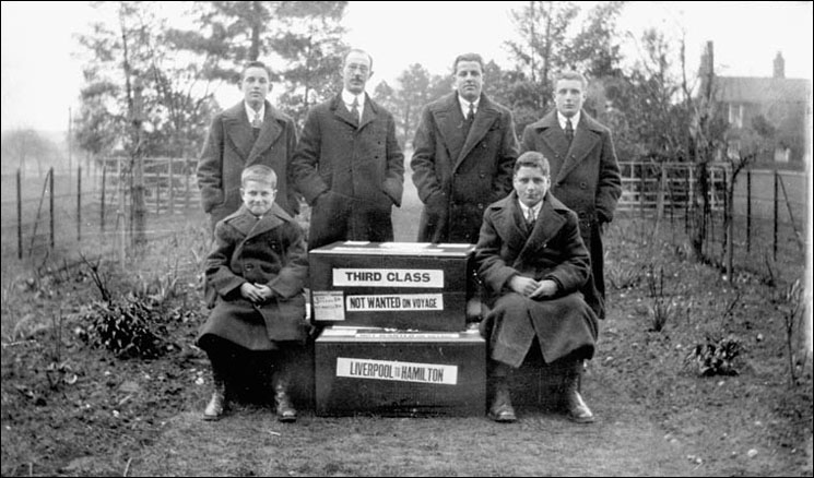 English immigrant boys with their trunks stamped "Liverpool to Hamilton."