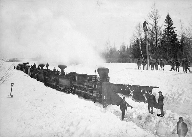 Snowplough engine and workers at Chaudière Station, Grand Trunk Railway