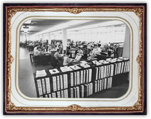 Black and white photo of DBS clerks coding imports and exports, circa 1960.